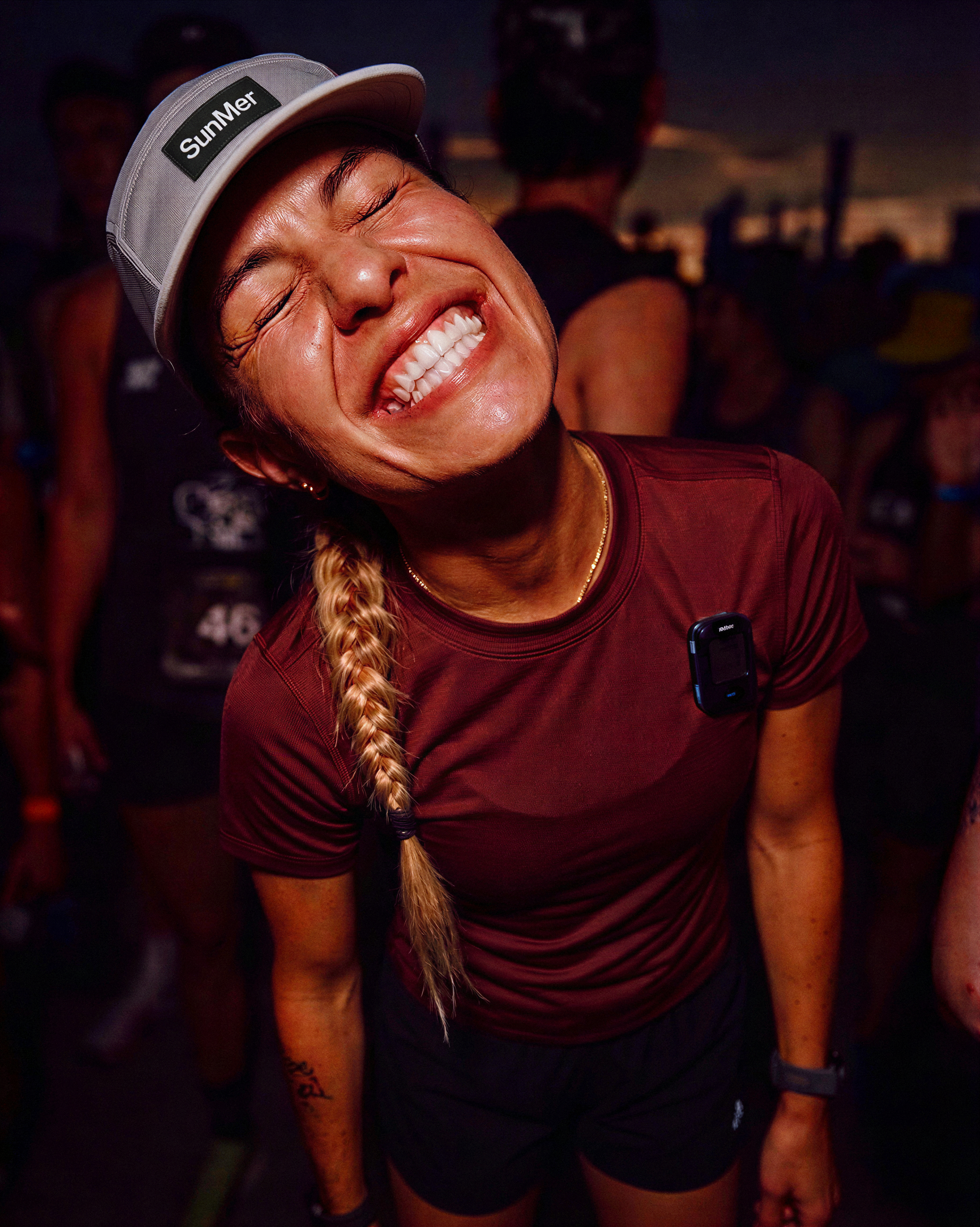 SunMer, Person wearing a cap and maroon shirt with a blurred background. Performance Sun Care. SunMer High-Performance SPF50 Sun Stick — COSMOS Natural Certified
